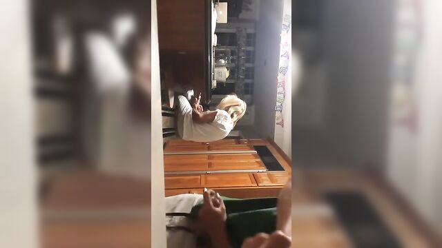 Son jerks off behind mom's back and cums - 4 image