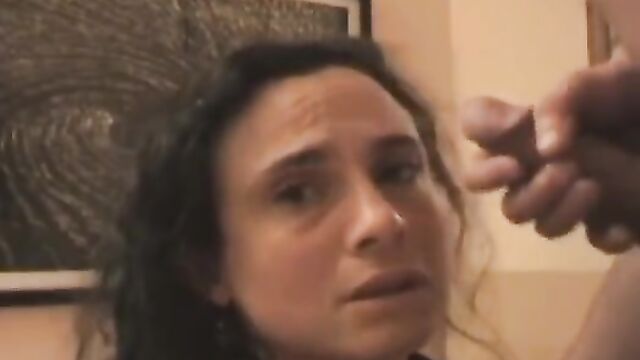 Son cumming hard on his mother's face