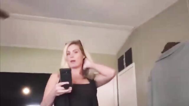 Lusty mommy poses nude in front of her son and seduces him for sex - 1 image