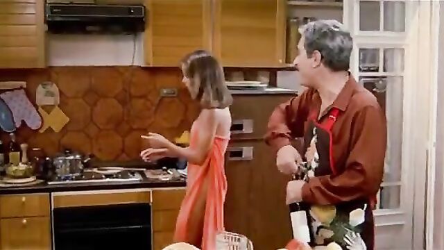 Pretty daughter topless in front of her father Scene from mainstream movie