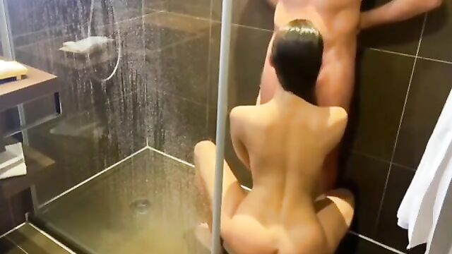 Stunning sister sucks her brother's cock in the shower - 3 image