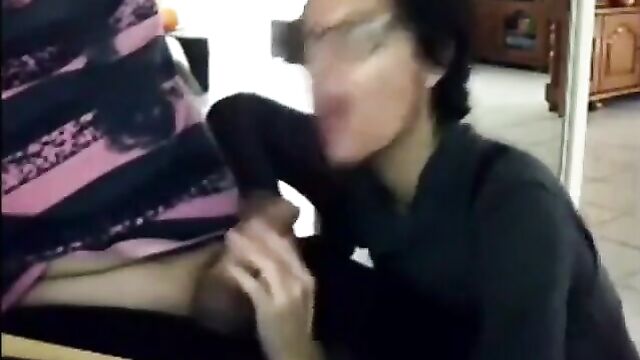 Prertty Mom sucking son's cock before she left - 1 image